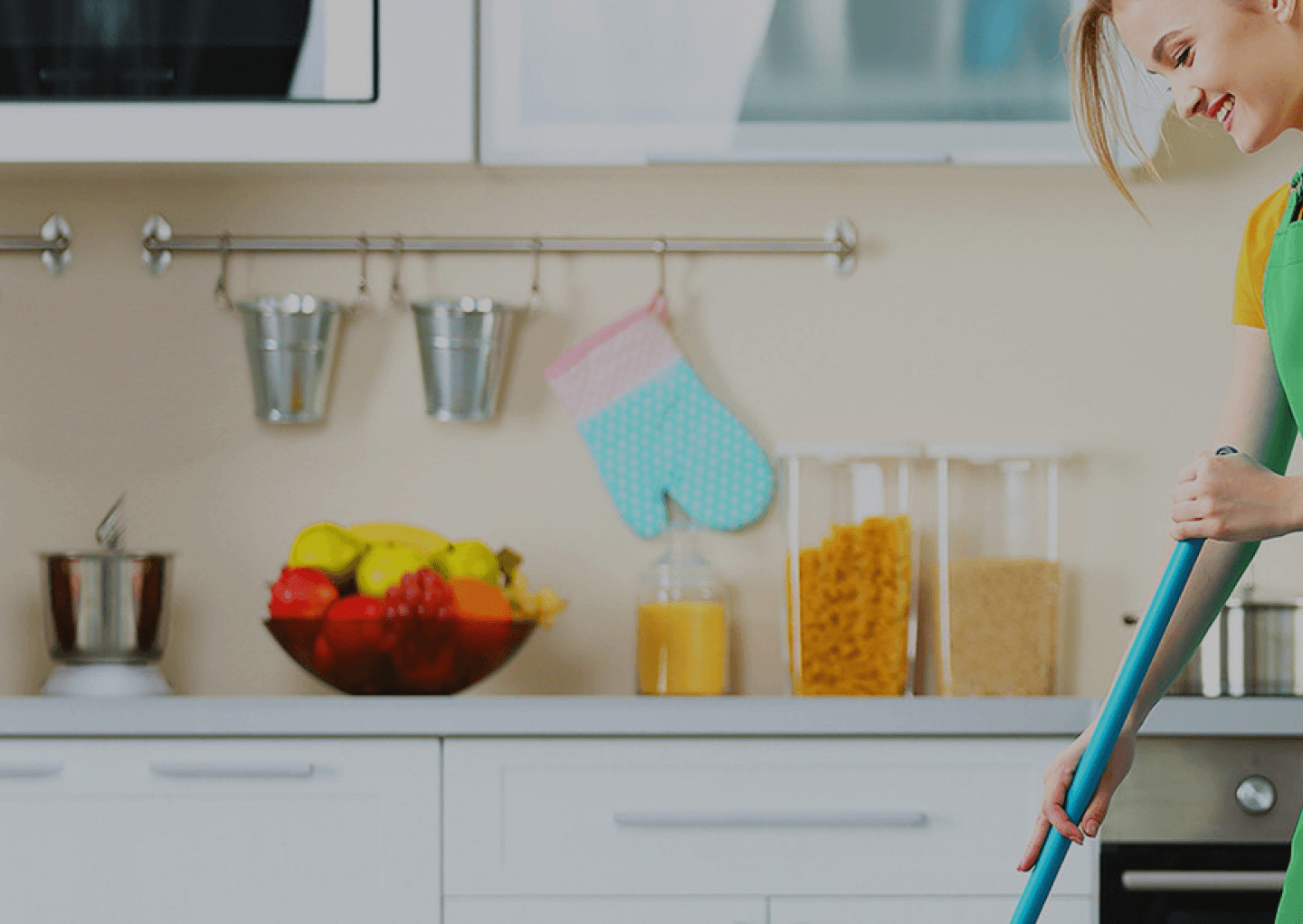 Professional cleaner in a Kelowna kitchen